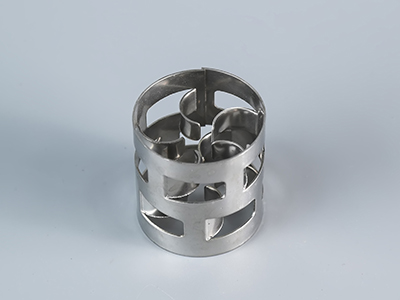 Metal packing for phenol production towers material compatibility